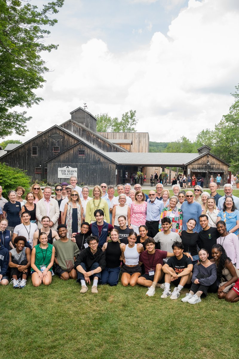 A posed group shot of School Sponsors and Dancers of The School on the Great Lawn.